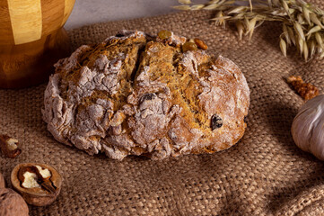 Rye bread with walnuts and garlic on the sack