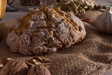 Rye bread with walnuts and garlic on the sack