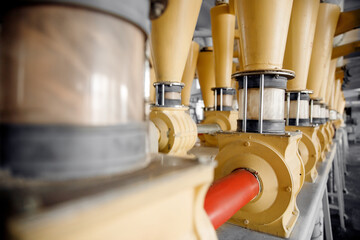 Modern electrical mill machinery for production of wheat flour. Equipment Factory Grain - obrazy, fototapety, plakaty