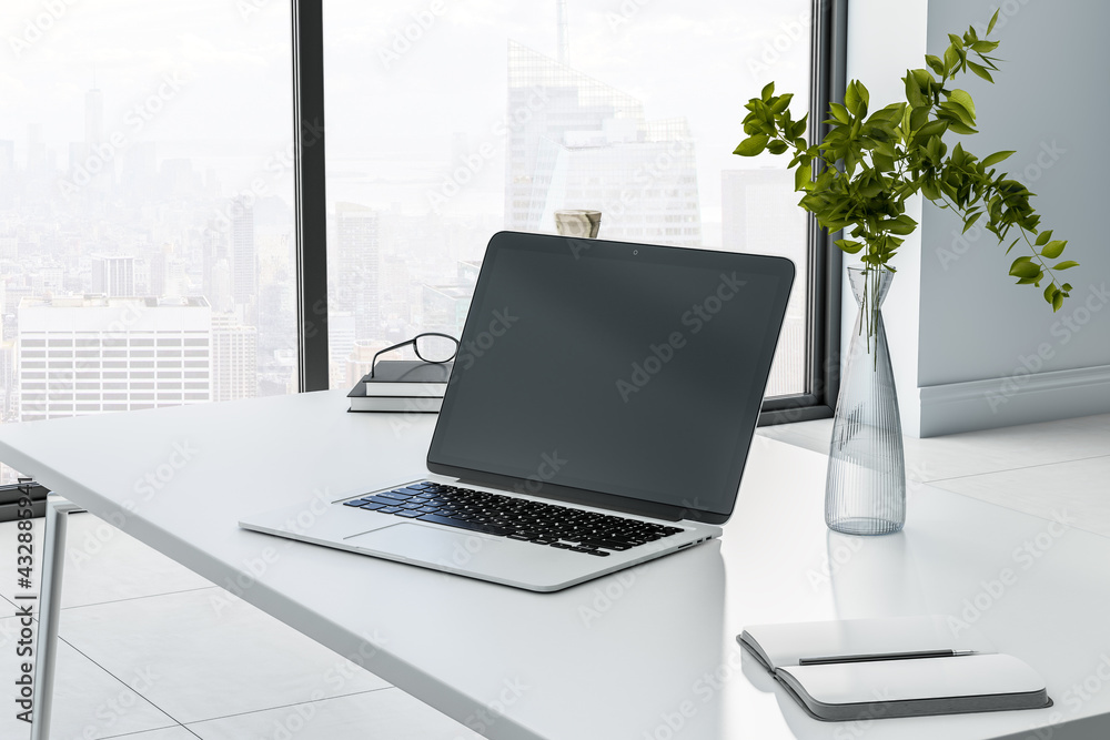 Aufkleber monochrome style work place with black laptop monitor with copyspace on marble tabletop, glass vase 