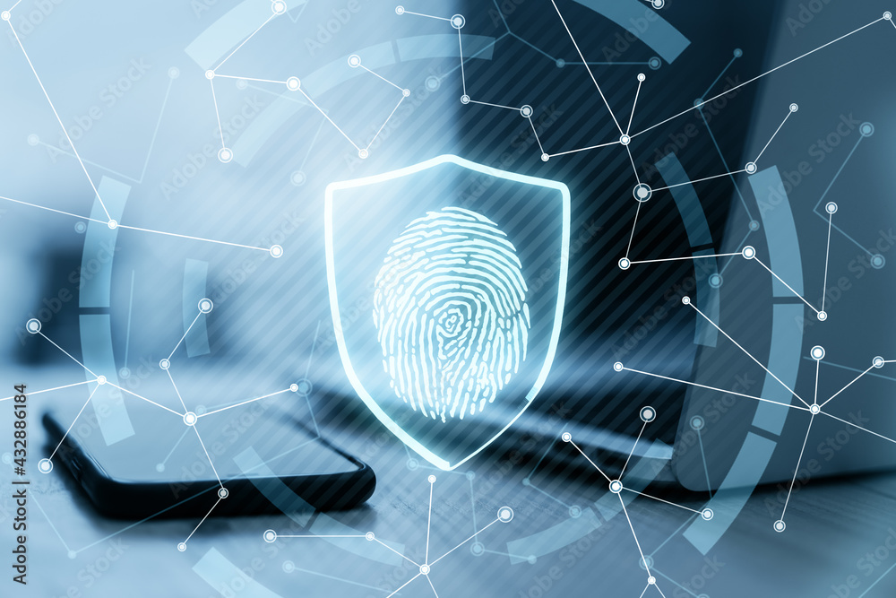 Poster cyber safety and protection concept with digital glowing fingerprint in shield on laptop with smartp