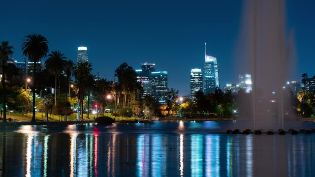 Los Angeles Downtown Skyline Reflections on Echo Park Lake Night Time Lapse California USA
