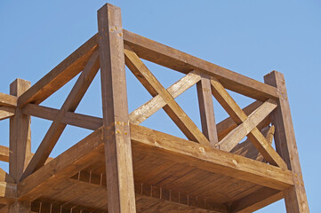 antique wooden watchtower against sky