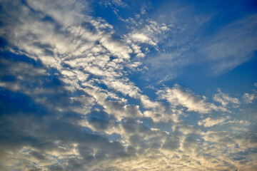 Evening sunset yellow blue sky with clouds