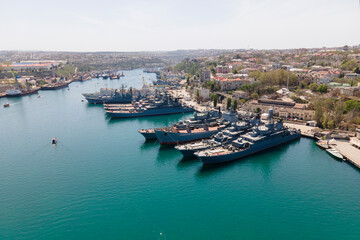 Fototapeta na wymiar Symbol of Sevastopol, navy military ships in sunny summer day, aerial view