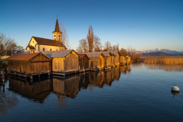 Beautiful scenery along of small harbor of the idyllic lakeside village of Busskirch, Rapperswil-Jona, St. Galen, Switzerland