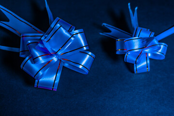 Pull Flower Ribbon for Gift Wrap Lighting Effect On Black Background Wallpaper Image Beautiful Abstract Scenario Image
