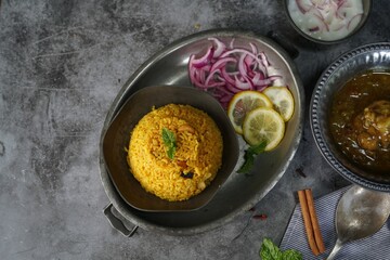 Irachi / Erachi choru chicken - Malabar meat rice served with raita and gravy