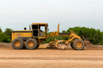 Grader Road Construction Grader industrial machine on construction of new roads. the blade of a...