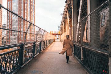 person walking on bridge woman New York 