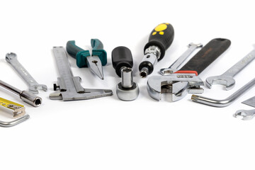 Tools for construction and household repairs on a white background.