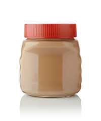 Nut paste in a glass jar isolated.