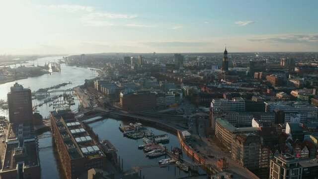 Aerial view of traditional buildings and famous landmarks by the river Elbe in Hamburg port