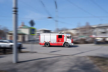 Novokuznetsk,Russia-23.04.2021.A fire truck rushes at high speed to the fire