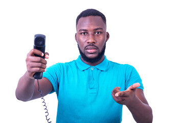 portrait of a young businessman showing telephone.