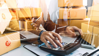 Online sales ideas for work at home. Asian man is answering phone calls. To accept orders from online customers.Very good sale. online Business and E-commerce.Online shop Sell products at home.