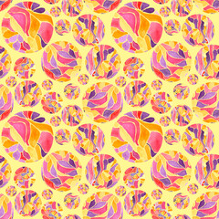 A pattern with colored balls of different sizes on a yellow background.