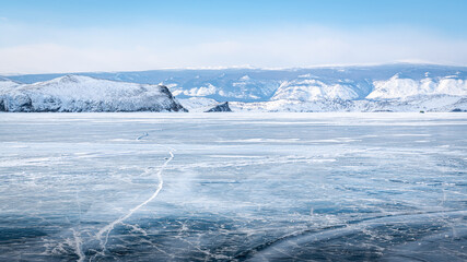 Long cracks in the spring Baikal ice