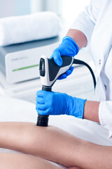 Anti-cellulite treatment at medical spa center. Radial Acoustic Wave Therapy
