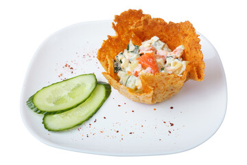 a portion of salad in a cheese basket