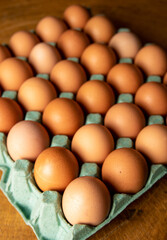 Eggs, box of red eggs in Brazil in a beautiful alignment, selective focus.