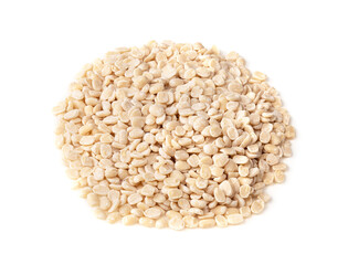 pile of raw split black gram beans on white