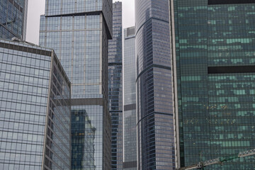 Glass skyscraper of the Moscow City business center in cloudy weather. Russia