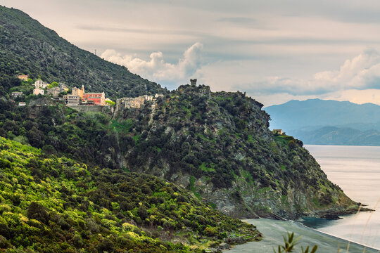 Nonza village with its black sand beach