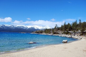 A Winter morning look along the beach of Lake Tahoe Placer County California.
