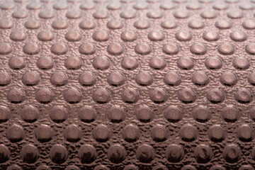 Metal coating and textured floor and backdrop