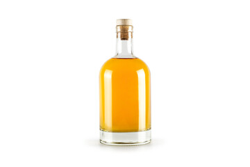 Transparent bottle with golden alcohol liquid inside isolated on white background.