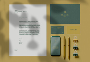 Top View of Stationery Set and Smartphone Mockup