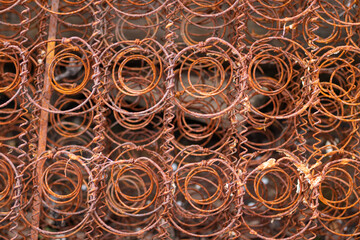 Rusty steel coil springs. Vintage background closeup.