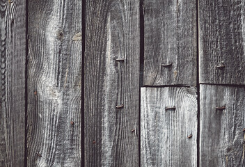 Close up picture of an old rough wooden board wall.