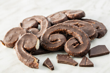 Sweet pastry palmeritas with chocolate icing.