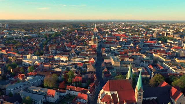 Drone flying through Augsburg city center. Cathedral, Ratskeller, St. Ulrich Church.