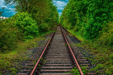 Fototapeta premium old rusty and abandoned railway line