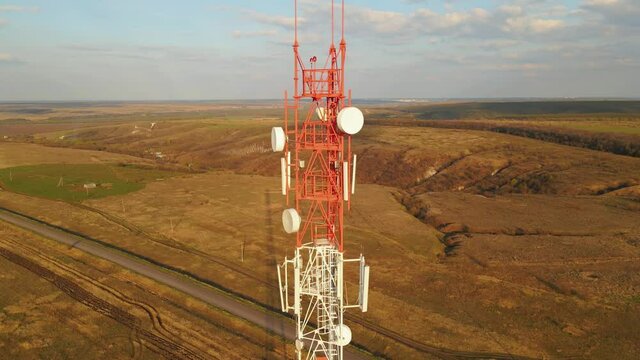 Telecommunication tower in a rural location. Telecom tower antennas and satellite transmits the signals of cellular 5g 4g mobile signals