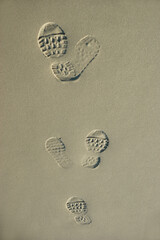 Fuss Abdrücke im Sand - abstrakt