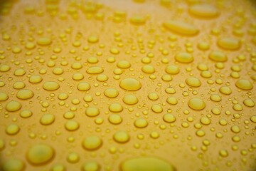 Hydrophobic effect on car varnish after using ceramic coating. Water drops on car