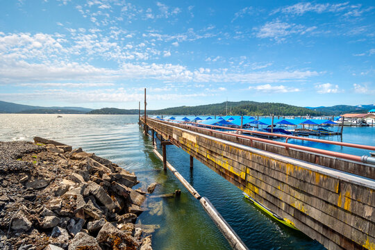 A marina with boat slips and dock along the lake near Blackwell island and downtown, in Coeur d'Alene, Idaho, USA