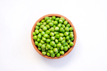 green peas on bowl on white background.