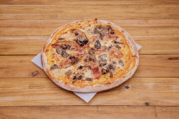 Pizza with mushrooms and Italian guanciale