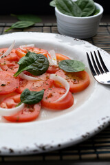 Spinach, tomato and onio salad