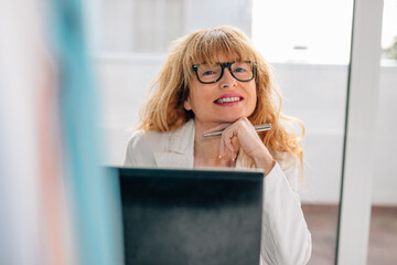 female worker in office with computer