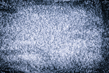 Old vintage gray-blue background with white spot. Textured paper