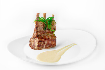 Dry-Aged All-Natural Lamb Rib Chops. Banquet festive dishes. Gourmet restaurant menu. White background.