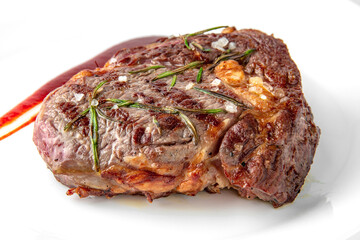 Dry aged beef steak Medium Rare. Banquet festive dishes. Gourmet restaurant menu. White background.