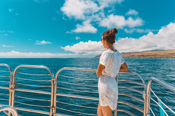 Cruise ship elegant lady in white cover up beach dress relaxing on boat deck watching scenery...