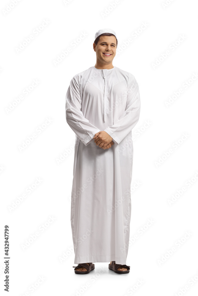 Poster full length portrait of a young muslim man in white dishdasha